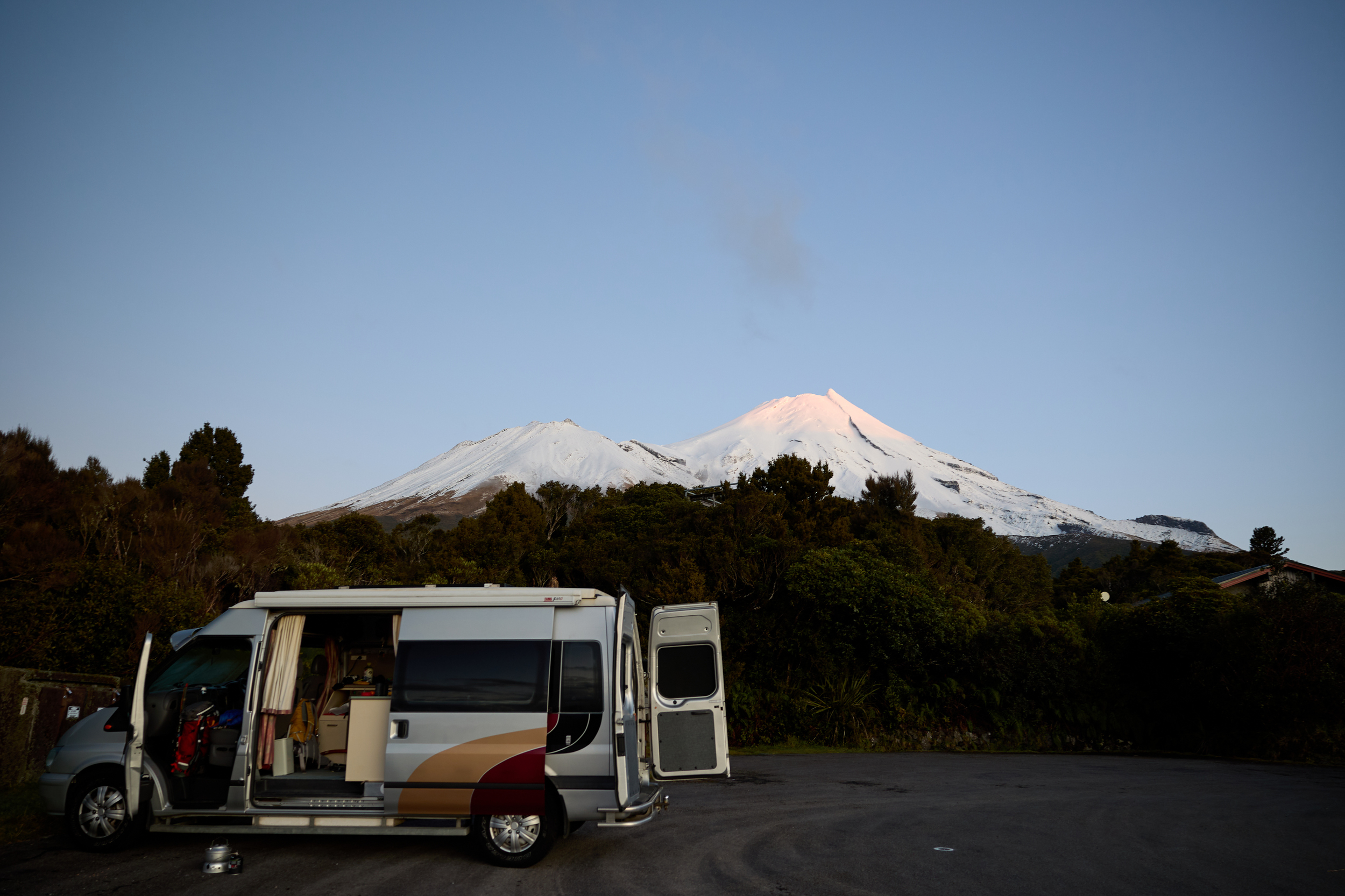 Looking up at Taranaki Maunga from the car park of Dawson Falls visitor centre