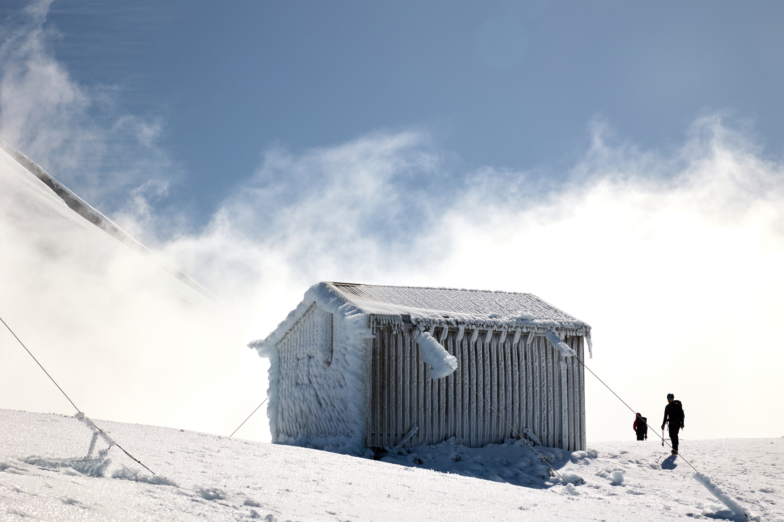 Syme hut encrusted with ice on the windward side